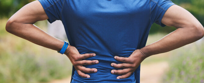 man experiencing back pain