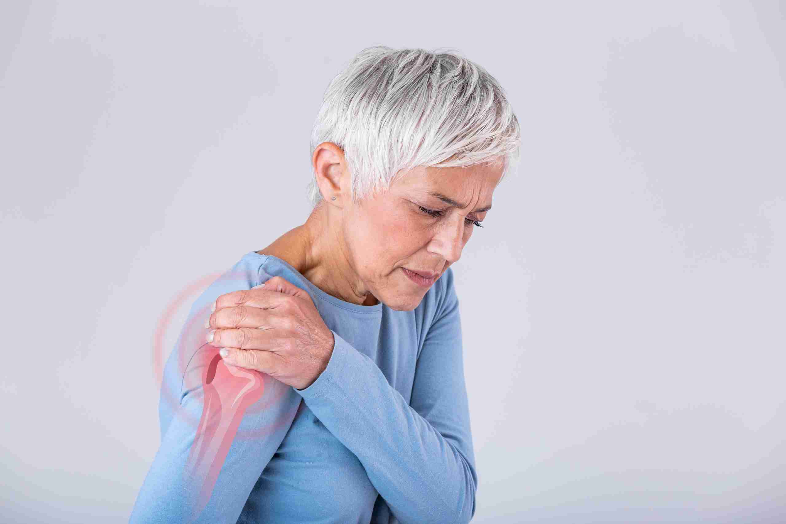 Senior woman with shoulder pain